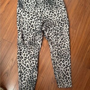Evolution and Creation Black and Gray Leggings with Animal Print